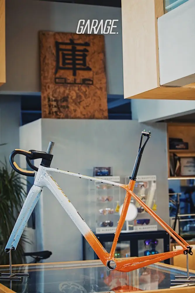 Voicevelo G Major carbon gravel frameset displayed on an authorized dealer counter
